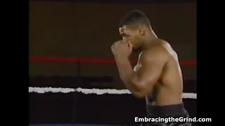 Mike Tyson shadowboxing with jabs