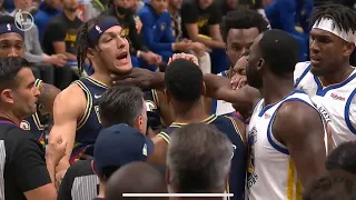 Draymond Green and Aaron Gordon get into it after Draymond pokes Jokic in the eye!