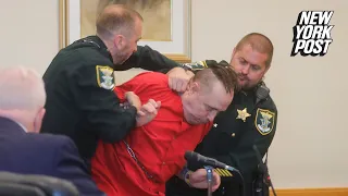 Florida murderer punches his lawyer as he is sentenced to death for killing child and baby-sitter