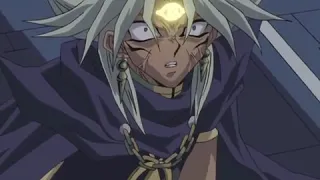 Marik gets punched by Obelisk the Tormentor