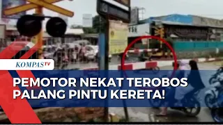 Nekat Terobos Palang Pintu Kereta, Pengendara Motor Nyaris Terlindas!