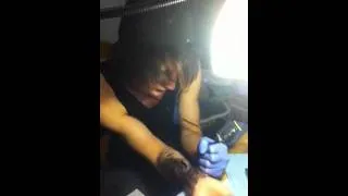 Casey gives himself a Tattoo