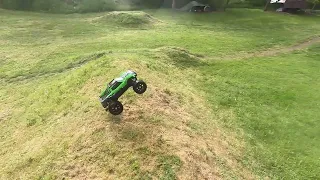 Traxxas 8S XMaxx... Bashing at the BMX Track.  with poor PM's. I for got a couple screws.  ooops,