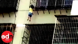 Girl Dangling by her Head from Building Rescued in China