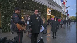 Brown Thomas Doorman sings fly me to the moon #busker #mustwatch