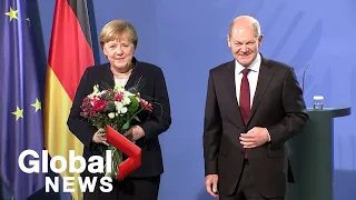 Angela Merkel era comes to an end as Olaf Scholz takes over as German chancellor