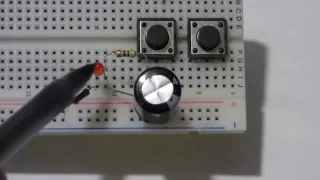 Fade away LED circuit using a capacitor. Electronzap step by step build and schematics.