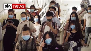 Beijing moves to limit new COVID outbreak