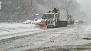 DSNY Snow Plows Going To Work During A Snowstorm In Manhattan, New York