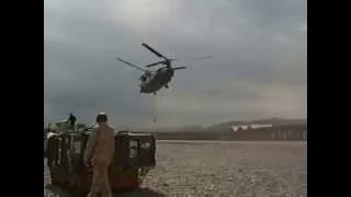 Chinook landing in front of troops Afghanistan