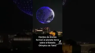 Cientos de drones forman el planeta tierra sobre el estadio olímpico de Tokio