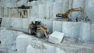 Huge Komatsu Wheel Loader Carrying Heavy Marble Columns At Birros Marble Quarries - Aerial View