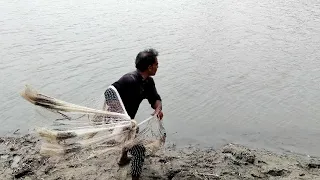 throwing cast net for fishing