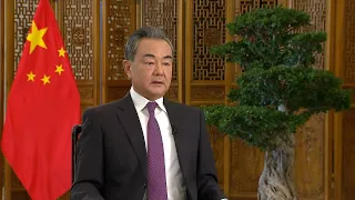 GLOBALink | Chinese FM stresses justice, peace, dialogue, respect in handling hotspot issues