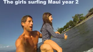 Keiki tandem surfing in Maui