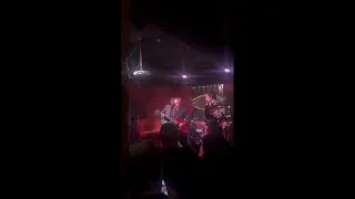 Blinken plays guitar and sings with a local band at a bar in Ukraine's capital