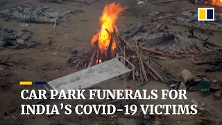 New Delhi car park turned into crematorium as India deals with catastrophic Covid-19 crisis