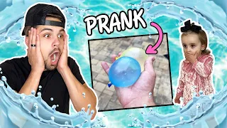 PRANKED OUR 2 YEAR OLD WITH A WATER BALLOON FIGHT!