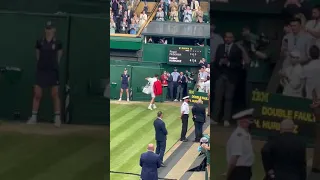 Roger Federer leaving the court after his quarterfinal loss at Wimbledon 2021
