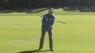 Golf lessons - How to play from a downhill lie