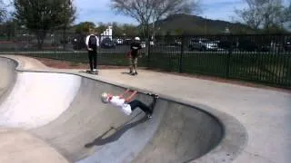 kid does a back flip on a scooter