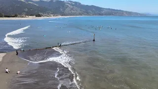 Small & sunny surf day at Bolinas beach, Marin County, California. Surf, longboard, SUP, drone