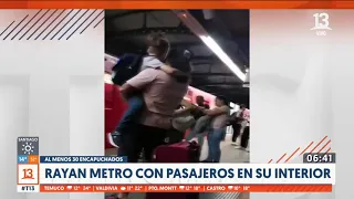 Encapuchados rayan todo un tren del Metro de Santiago en estación San Joaquín