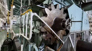 The massive 9 cylinder Hyundai - MAN B&W 9L60MC-C7 ship engine with 24000 Hp running at full speed