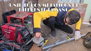 Como unir dos tubos metálicos