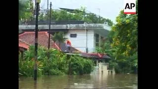 Floods inundate capital, blanketing markets, hospitals, homes