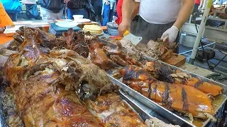 Serbian Masters Roast Huge Dose of Porks and Lambs. Street Food Fair in Italy