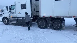 Stuck in snow blizzard trucker showing me how to chain up