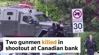 Two gunmen killed in shootout at Canadian bank