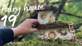 DIY fairy house built with natural & recycled materials