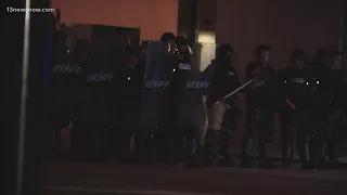 Three hours past curfew, law enforcement dons shields, asks Elizabeth City protesters to disperse