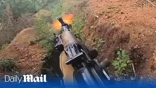 Ukraine soldiers bombard Russian observation post with grenades in POV footage