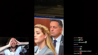 Amber Heard gets caught taking notes, but her pen doesn't touch the paper