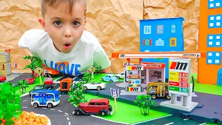 Vlad y Niki juegan con coches de juguete y construyen Matchbox City