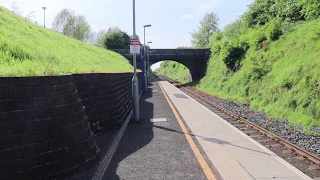 NIR 111 class 113 + 6 ballast hoppers passing Mossley West 13/05/2019