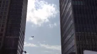 Lancaster bomber flies over Canary Wharf