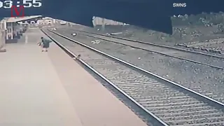 Cctv Footage Captures Rail Worker Saving Child From Oncoming Train