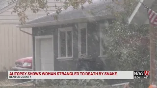 Coroner: Woman found dead was strangled by snake