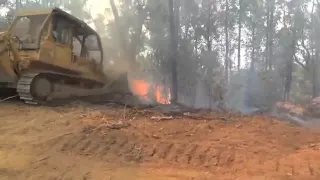 Bulldozers working at fires