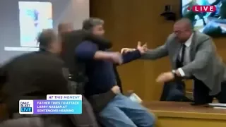 Father lunges at Larry Nassar in court before being restrained