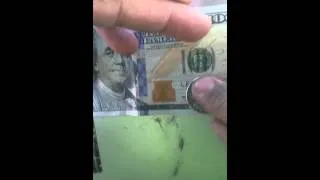 How to check if 100 dollar bill is real