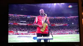 Mike Phillips performs National Anthem with his saxophone at Saints @ Falcons NFL Thanksgiving Game