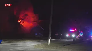 Several fire departments at the scene of a house fire in Illinois