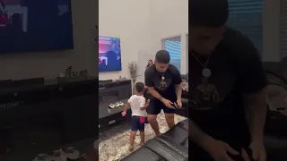 Mom catches dad and son throwing money at girls dancing on tv