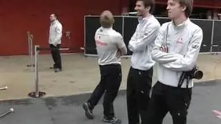 Mclaren guy playing with Ferrari mechanics