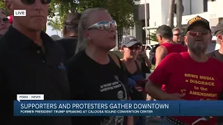 Supporters and protestors gather as Trump prepares to speak in Fort Myers